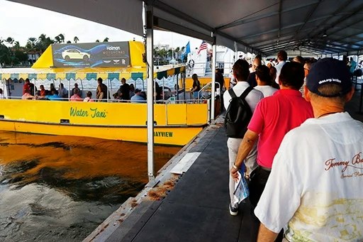 Attendees walking the docks at a Fort Lauderdale boat show
